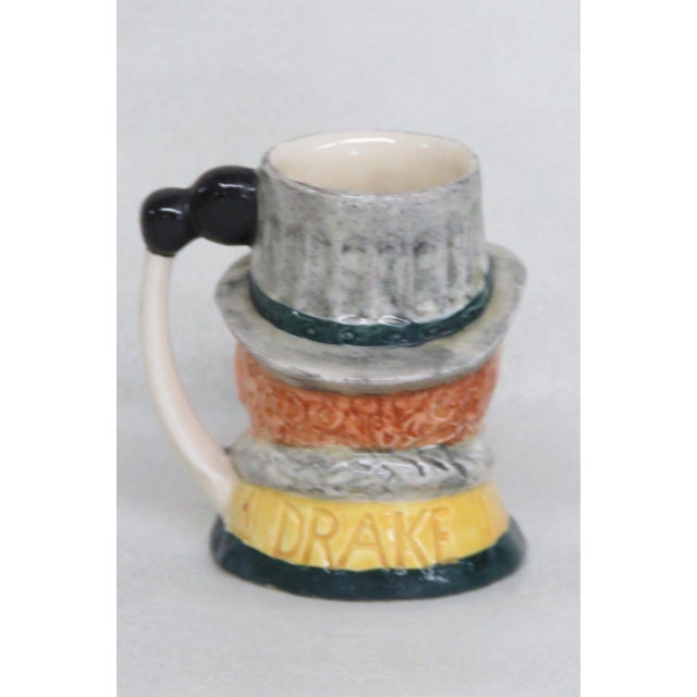 Small Toby mug designed by Lancaster and Sandland. Made and hand painted in England. The mug is signed with the name DRAKE...