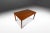 Introducing a highly functional, Danish-made expansion dining table built from a mix of solid and veneered Burmese teak...