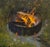 This oil on panel artwork captures the intimate glow of a campfire, with vibrant flames dancing against a dark, textured...