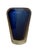 The Mid Century Modern heavy glass vase is almost round except for a wide flat front showing the blue vase encased in...
