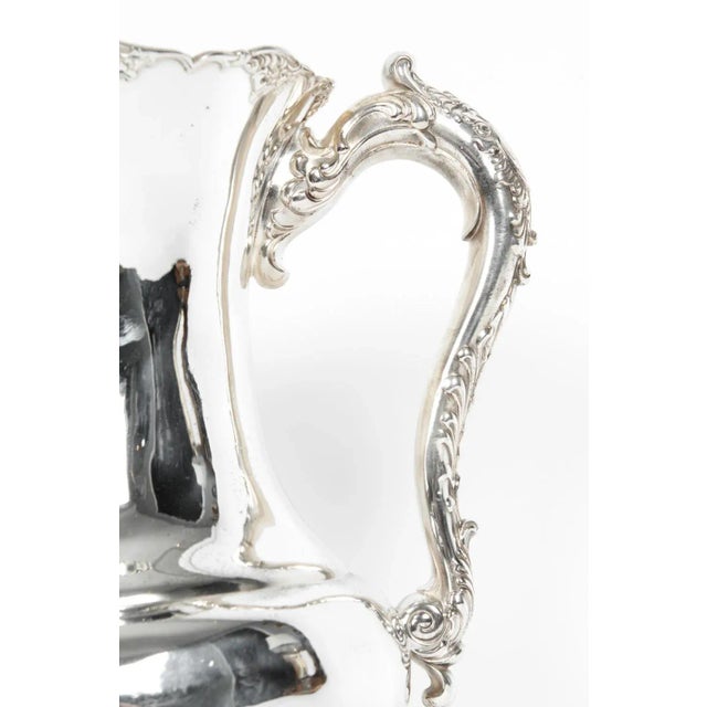 English silver plate on copper large three handles friendship cup vase / decorative piece. The piece is in excellent...