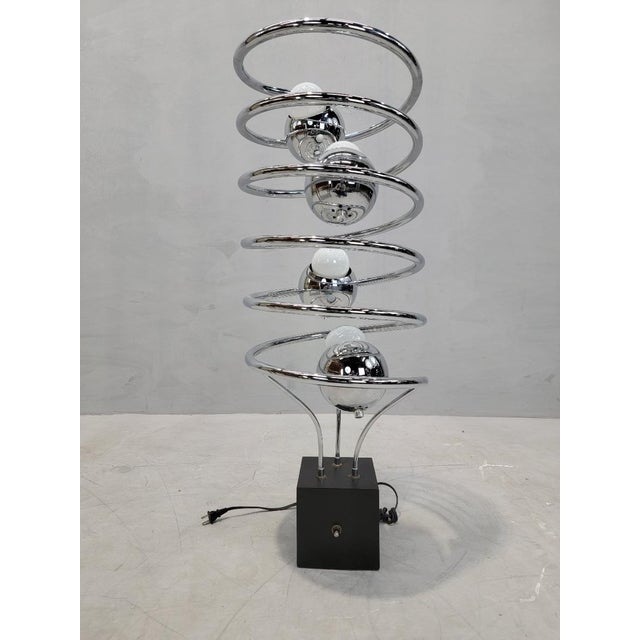 Vintage Mid Century Modern Atomic Space Age Chrome Abstract Table Floor Lamp This table/floor lamp has a swirling chrome...