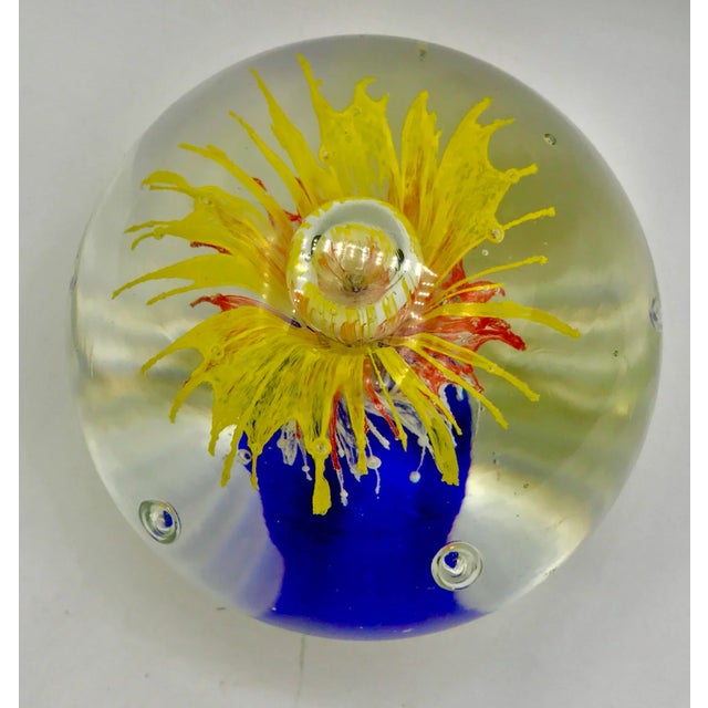 This Murano paper weight is exceptional with a explosion of color going from Cobalt blue to yellow, oranges and reds. From...