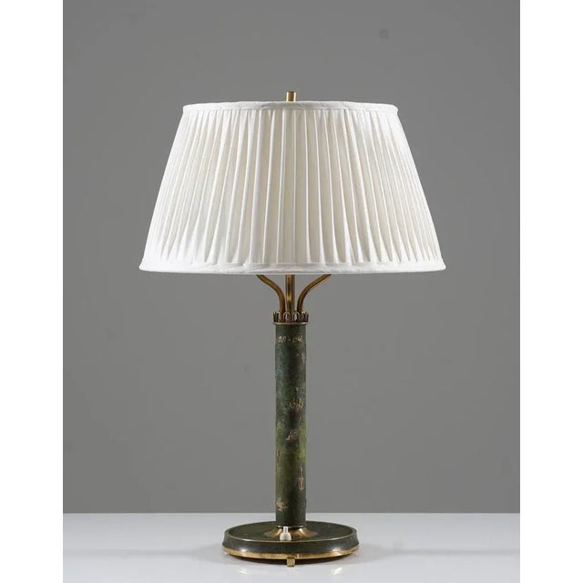 Table lamp manufactured by Liberty, Sweden, 1946. This lamp is most likely an in-house production, made in low numbers or...