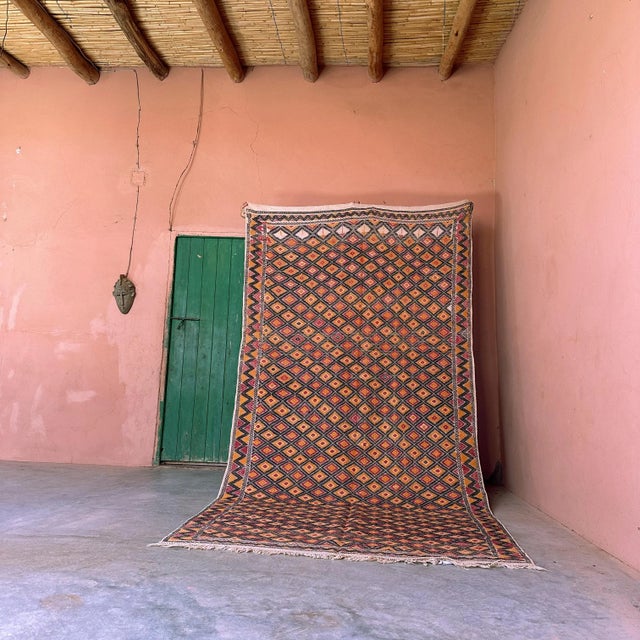 This vintage Moroccan rug is a true powerful women's artistic creation that is the first thing our eyes get caught when we...