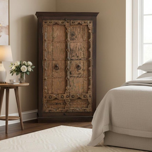 Dimensions: 48" W x 35" D x 84" H Add character and functionality to your space with this striking rustic ranch-style...