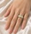 Elegant 14K yellow gold band ring featuring five natural oval opals. Estate piece with 1/4 inch wide band, size 6.75,...