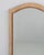 A larger-scale wooden mirror offering strong vertical presence and the ability to visually expand space. The...
