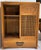 This is a handsome and useful Japanese Tansu Tabletop Storage Cabinet with two sliding grid patterned lattice doors with a...