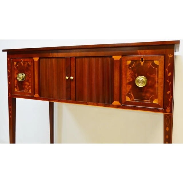 Sideboard by Baker - Historic Charleston Collection, store item# 433. It features inlaid wood and dovetailed drawers.