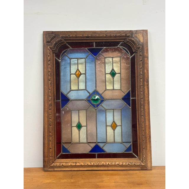 A stunning pair of 19th century English oak and stained glass panels, richly detailed and full of character. Each panel...