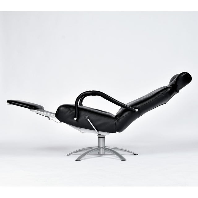 Percival Lafer Leather Relax Reclinesr, Brazil, 2003 One price for two chairs (sold as a pair) A striking swivel recliner...