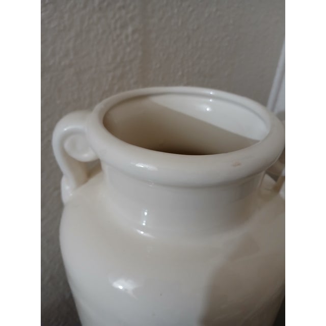 Lovely Italian white ceramic vase with scroll style handles. Made in the 90s, and in excellent condition. No chips or...