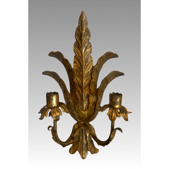 A fabulous pair of Antique Italian giltwood candelabras for 2 candles each. Hand carved probably in the Florence area of...