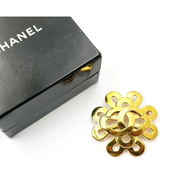 Chanel Vintage Gold Plated CC Twisted Flower Brooch *Marked 95 *Made in France *Comes with the original box -It is...