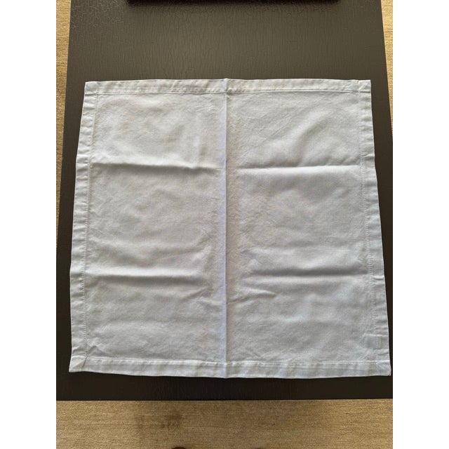 Set of 12 new, never used Matouk dinner napkins. Approx. 22" x 22" (slight variations in size). 100% cotton. Machine...