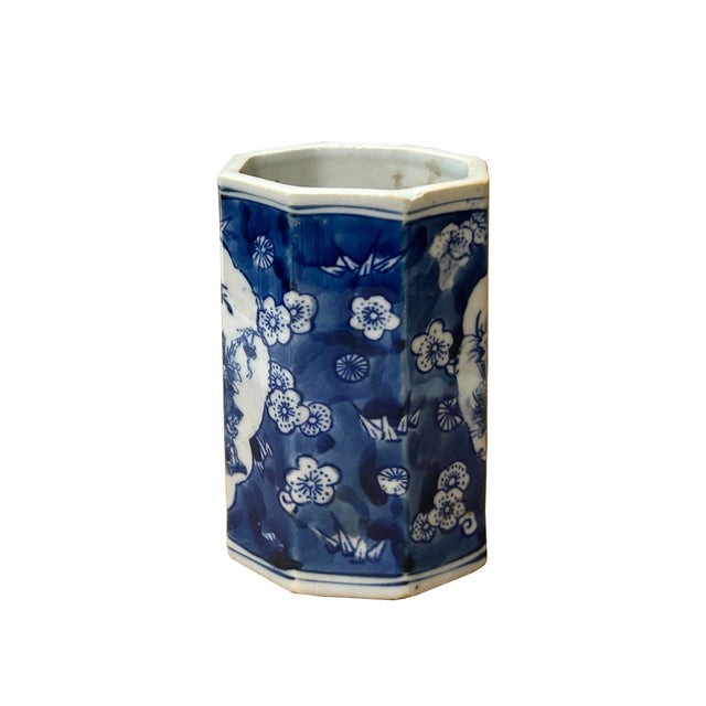 Add a touch of classic elegance to your collection with this charming 4-inch blue and white porcelain vase. Expertly...