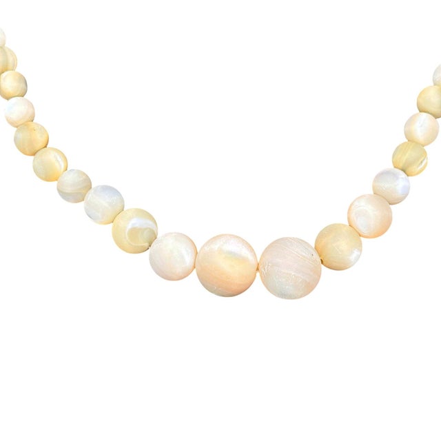 Capture the essence of summer sweetness with our Lemon Drop Delight Yellow Jade Necklace. This charming piece, crafted...
