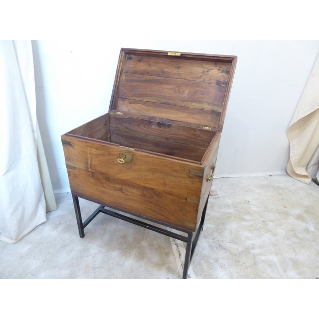 This 19th Century camphorwood box is on a later made stand and measures 25.5"H x 23"W x 13.25"D. It ships in two parts...