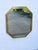 This vintage mirror is made out of metal and mirror. We believe the mirror was made by Willy Rizzo, however it is not...
