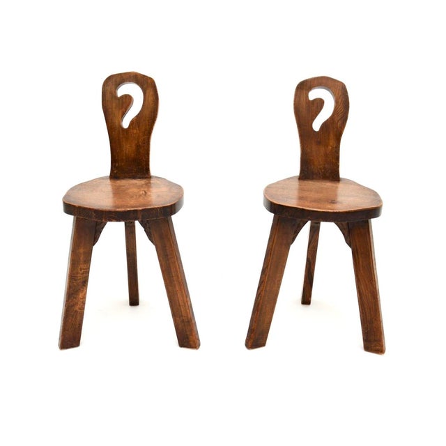 A charming and extremely well made pair of vintage Brutalist side chairs in solid elm. They were made in England, they...