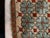 Vintage hand-embroidered textile runner or mat. Features an intricate, all-over geometric pattern with a decorative...