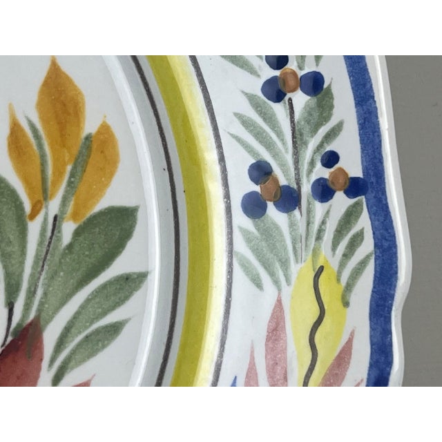 A wonderfully colorful vintage HB Quimper rooster plate, entirely hand painted in Brittany, France. The center features...