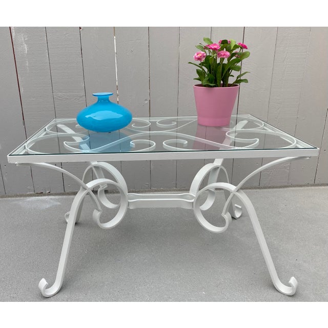 Very rare craftsmanship for this unusual Iron 1950’s French coffee table . Made in 2 parts, the base and the removable...