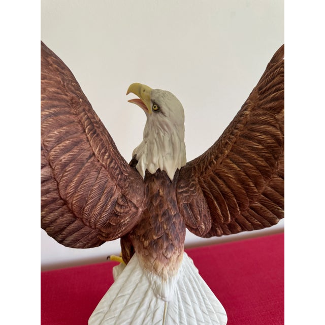This Boehm Constitution Eagle on on the white column base is exquisitely hand-painted and hand-crafted using traditional...