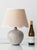 A mid-century French studio pottery stoneware table lamp by ceramist Robert Héraud, paired with a new woven jute scalloped...
