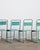 Set of four 20th-century Belgian industrial metal chairs with turquoise paint, as described in the original Salter LA...