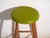 This antique wooden stool is a three-legged seat with a round seat and turned splayed legs joined by stretchers. It...