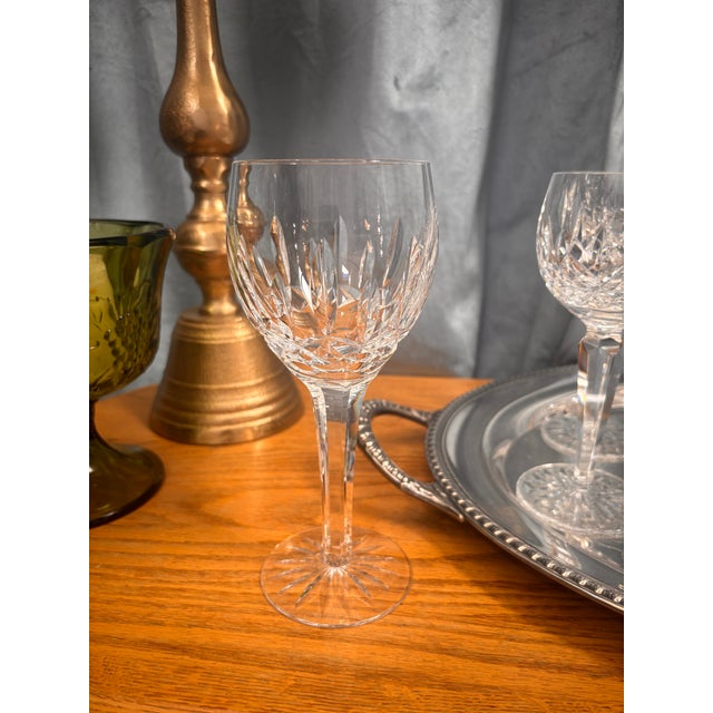 Beautiful set of 9 authentic Waterford Crystal Lismore stemmed glasses featuring Waterford’s iconic hand-cut Lismore...