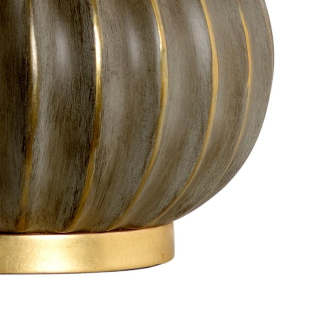 Aged gray with antique gold highlights on ceramic gourd shape, antique gold leaf mounting 29.5h x 6.5w x 6.5d Shade...