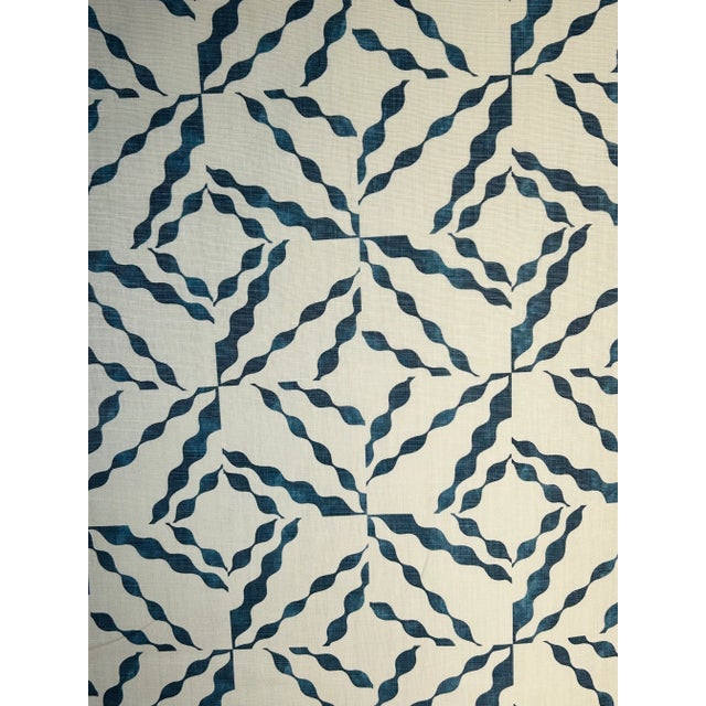 An original design with precision hand screen printing. The two flatbed screen colors of Indigo are perfectly laid on top...