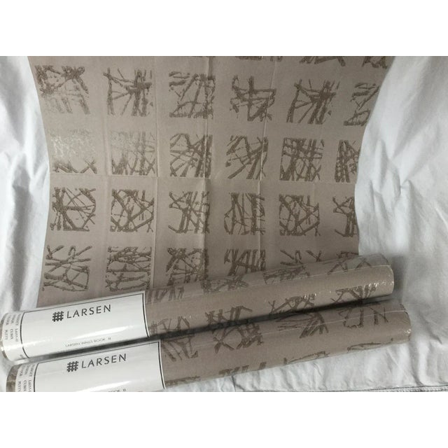 For sale are 2 rolls of Larsen Wallpaper in pattern 'Cubix', color 'Putty'. The number is . Each roll is 20.5' wide. The...