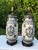 A handsome pair of monumental vintage table lamps featuring crackle glazed art pottery urn-form bodies with applied loop...