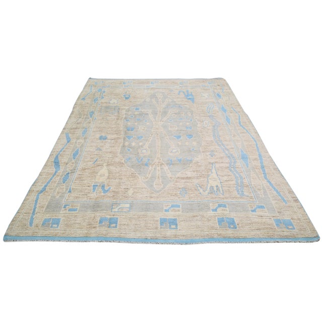 Vintage Turkish Anatolian Oushak hand knotted rug with natural colors, soft texture and fine weave.