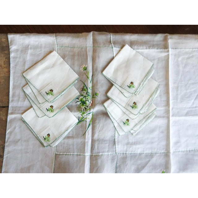 Vintage mid 20th century linen organza hand embroidered luncheon tablecloth and 6 napkins. White with green floral...