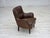 1960s, Danish armchair. Brown furniture leather, ash wood legs, springs in the seat. Original good condition no smells, no...