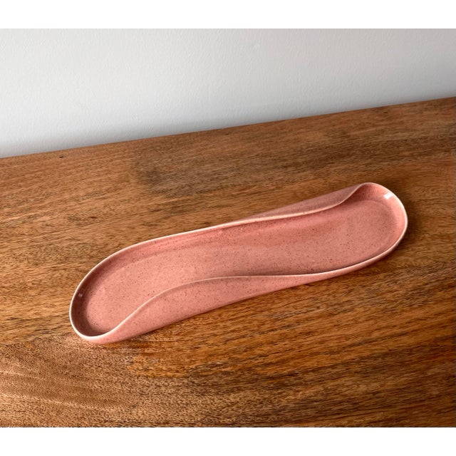 A beautiful mid-century relish or celery tray from Russel Wright for Steubenville. As you can see from the photographs,...