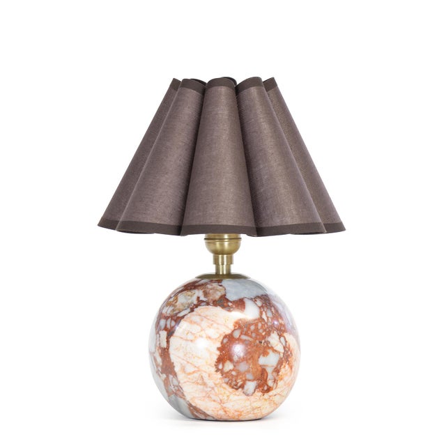 Richly veined natural marble forms the foundation of the Giorgio Mini Table Lamp, bringing depth and character to its...