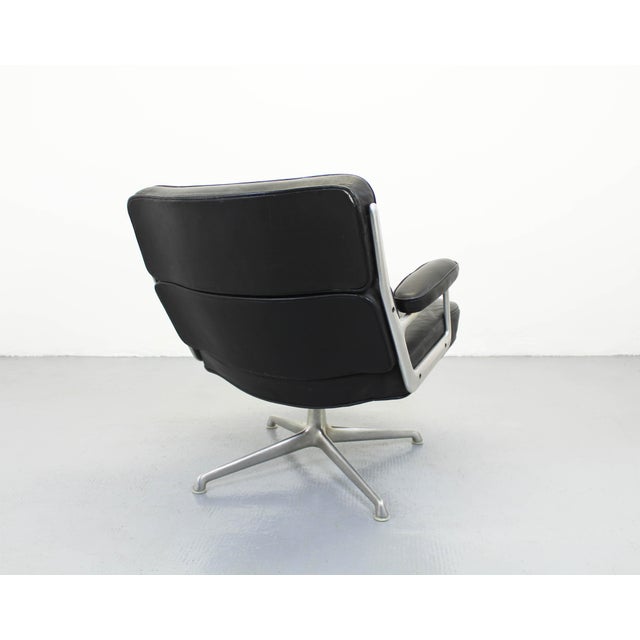 Set of Vintage Lounge Chair with Ottoman by Charles and Ray Eames for Herman Miller, 1970s, in Good conditions. Designed...