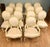 A superb and highly decorative set of fourteen french louis xvi style dining chairs, comprising 12 side chairs and two...