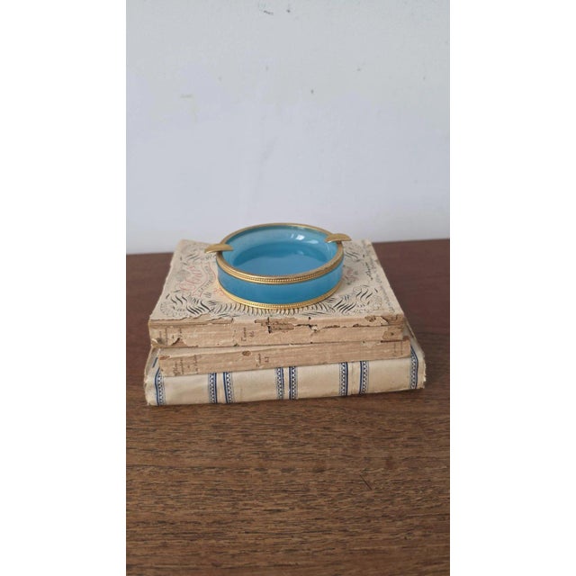 Materials: Murano opaline glass, brass-tone metal Dimensions: 4.5 in diameter × 1 in high (11.4 × 2.5 cm) Weight: 225 g...