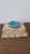 Materials: Murano opaline glass, brass-tone metal Dimensions: 4.5 in diameter × 1 in high (11.4 × 2.5 cm) Weight: 225 g...