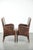 We are offering this set of 2 beautifully finished dining chairs/side chairs with armrests made of cowhide leather. This...
