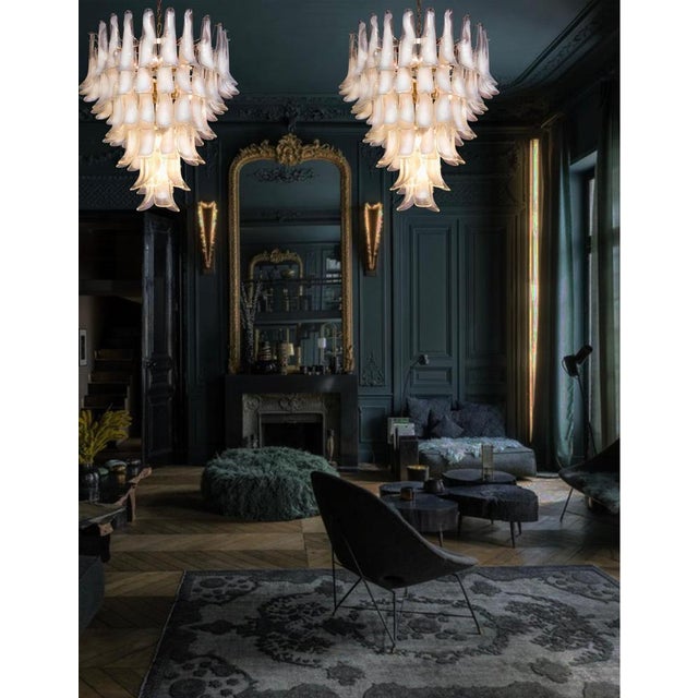 Pair chandeliers made by hand blown glass chandelier composed by 75 glass petals (transparent and white “lattimo”) in a...