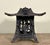 This vintage Japanese cast iron lantern is formed in the shape of a stylized pagoda with pierced panels and a gently...