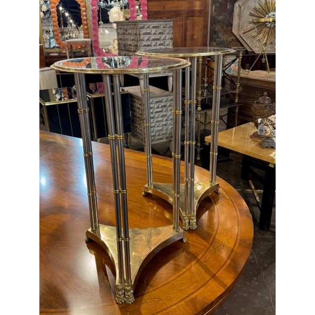 Pair of Italian Jansen manner steel and brass side tables. Parisian neoclassicism, brass accents, steel frames,...